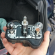 In my UK spec cluster, we have a tail light, an indicator in the middle and a stop/tail.